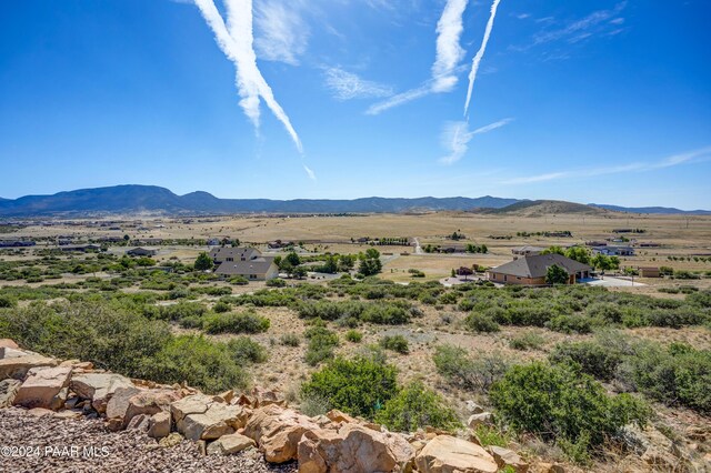 view of mountain feature featuring a rural view