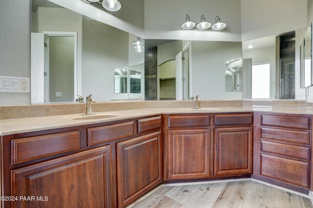 bathroom featuring vanity and hardwood / wood-style flooring