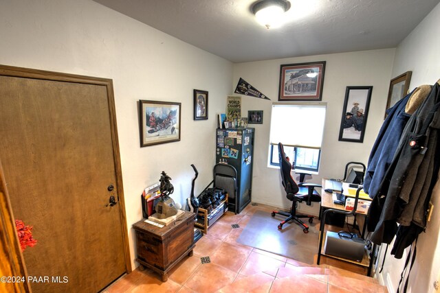 home office featuring light tile patterned floors