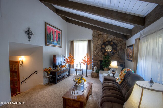 living room with carpet flooring, wooden ceiling, beamed ceiling, and high vaulted ceiling