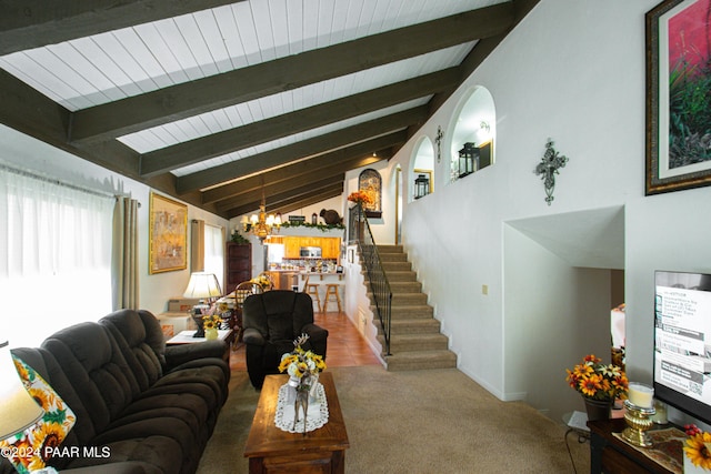 living room with carpet flooring, lofted ceiling with beams, wooden ceiling, and a chandelier