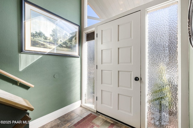 foyer featuring tile patterned flooring