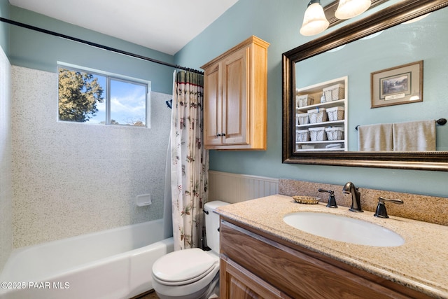 full bathroom featuring vanity, shower / bathtub combination with curtain, and toilet