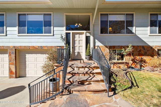 entrance to property featuring a garage