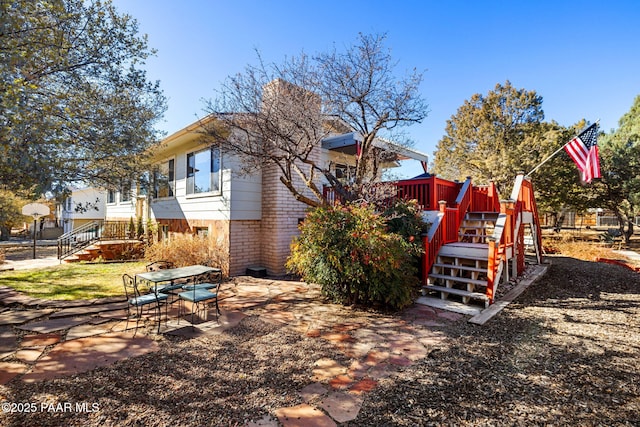 view of yard with a deck