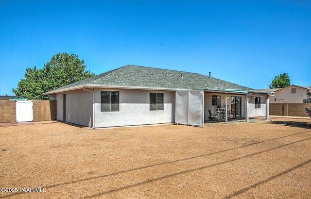 4761 N Tonto Way, Prescott Valley, AZ 86314 - back of property featuring a fenced backyard, a patio area, a shingled roof, and stucco siding