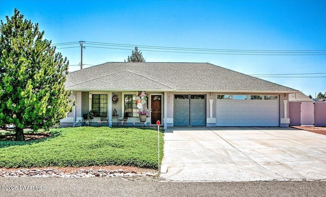4761 N Tonto Way, Prescott Valley, AZ 86314 - ranch-style home featuring an attached garage, driveway, covered porch, a front lawn, and stucco siding