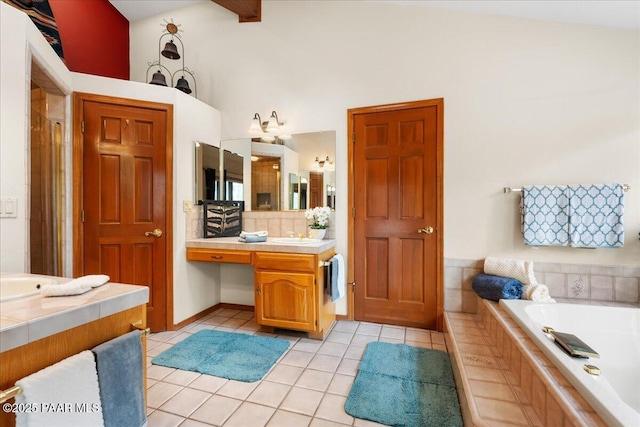 full bathroom featuring vanity, vaulted ceiling with beams, a shower stall, tile patterned floors, and a bath