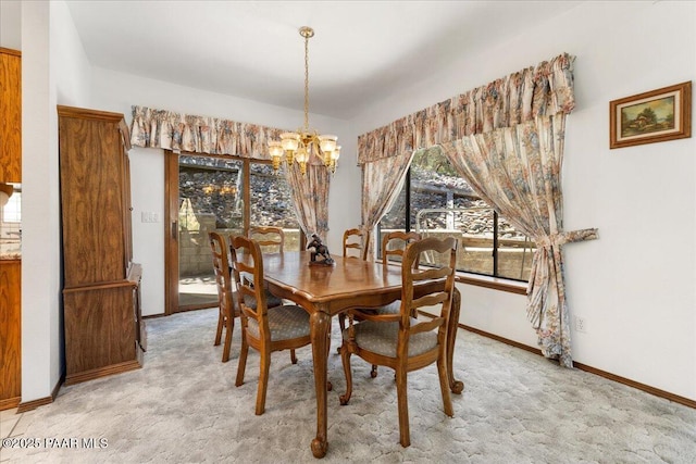 110 High Chaparral Loop, Prescott, AZ 86303 - dining area with a chandelier, light carpet, and baseboards