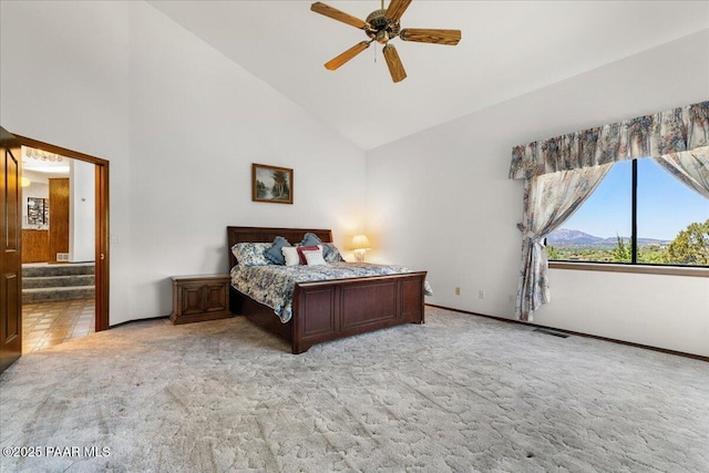 110 High Chaparral Loop, Prescott, AZ 86303 - bedroom featuring light carpet, high vaulted ceiling, baseboards, connected bathroom, and ceiling fan