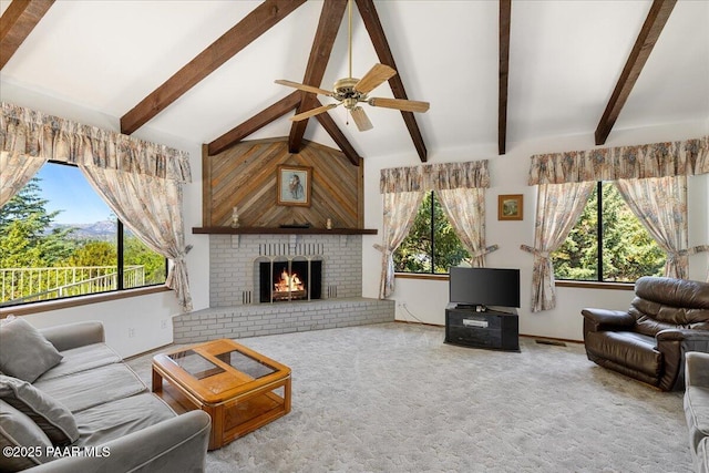 110 High Chaparral Loop, Prescott, AZ 86303 - living area featuring ceiling fan, healthy amount of natural light, a fireplace, and carpet flooring
