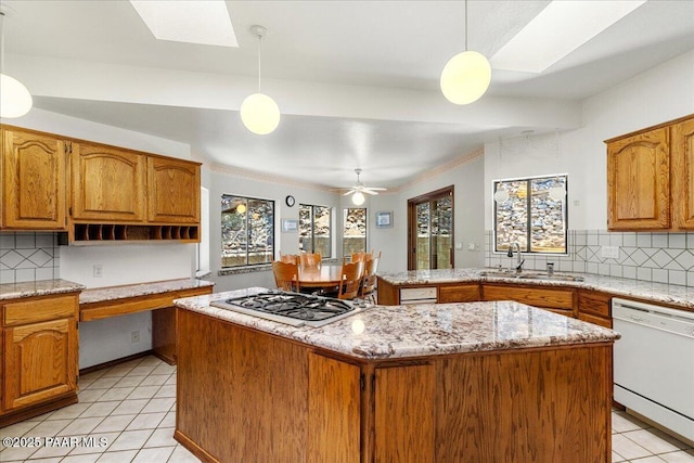 110 High Chaparral Loop, Prescott, AZ 86303 - kitchen featuring dishwasher, a sink, gas stovetop, light tile patterned floors, and decorative backsplash