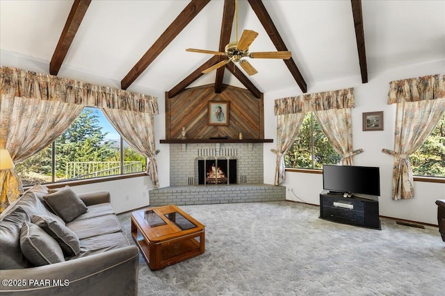 110 High Chaparral Loop, Prescott, AZ 86303 - living room featuring plenty of natural light, ceiling fan, carpet flooring, and a brick fireplace