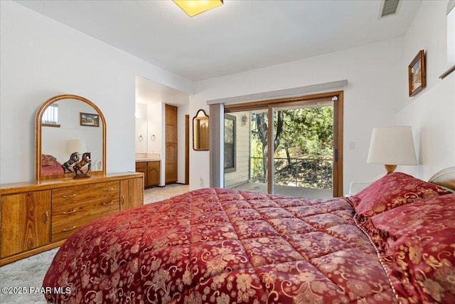 110 High Chaparral Loop, Prescott, AZ 86303 - bedroom with access to exterior, light colored carpet, and ensuite bath