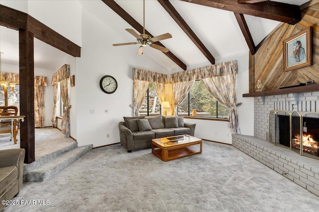 110 High Chaparral Loop, Prescott, AZ 86303 - carpeted living room featuring baseboards, high vaulted ceiling, a ceiling fan, beam ceiling, and a brick fireplace