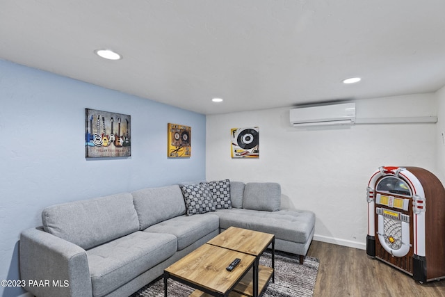 living room with dark hardwood / wood-style floors and a wall mounted air conditioner