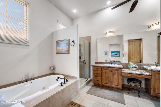 bathroom featuring ceiling fan, tile patterned flooring, vanity, and shower with separate bathtub