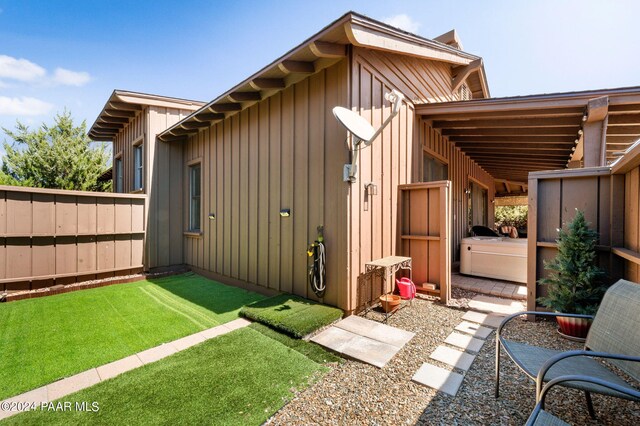 exterior space with a yard