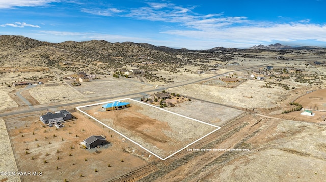 drone / aerial view featuring a mountain view