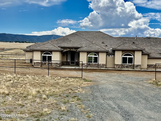 view of front of house with a mountain view