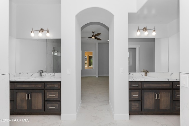 bathroom with ceiling fan and vanity