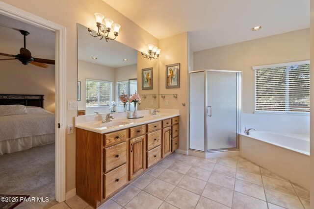 115 E Rosser St, Prescott, AZ 86301 - full bathroom with connected bathroom, double vanity, a garden tub, a stall shower, and ceiling fan