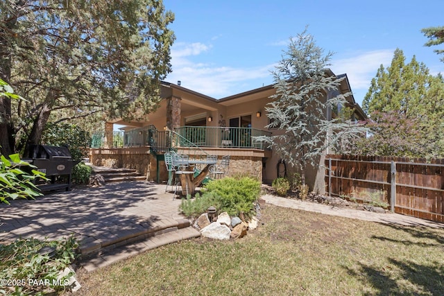 115 E Rosser St, Prescott, AZ 86301 - rear view of house featuring stairway, a patio, and stucco siding