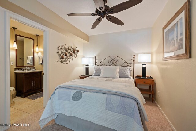 115 E Rosser St, Prescott, AZ 86301 - bedroom with light colored carpet, connected bathroom, and ceiling fan