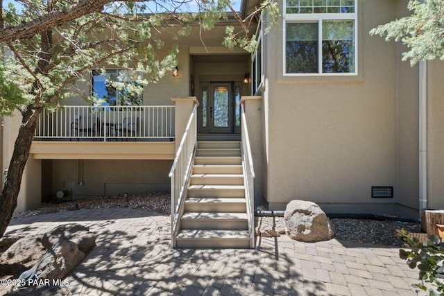 115 E Rosser St, Prescott, AZ 86301 - doorway to property with stucco siding and a patio