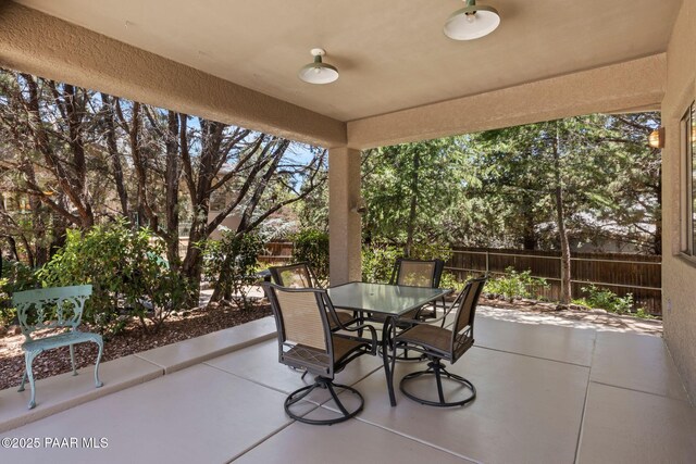 115 E Rosser St, Prescott, AZ 86301 - fenced backyard featuring a patio area and outdoor dining space