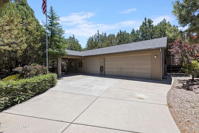 115 E Rosser St, Prescott, AZ 86301 - single story home with an attached garage, driveway, and a shingled roof