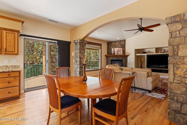 115 E Rosser St, Prescott, AZ 86301 - dining space featuring ceiling fan, healthy amount of natural light, arched walkways, light wood finished floors, and vaulted ceiling