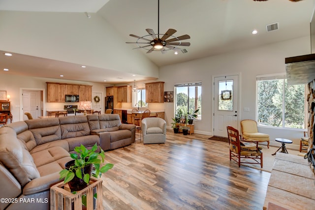 1365 W Ridge Dr, Prescott, AZ 86305 - living room featuring light wood finished floors, a ceiling fan, recessed lighting, and high vaulted ceiling