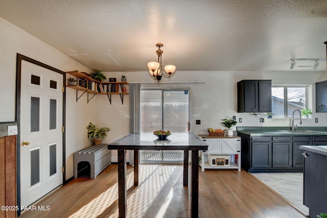 garage with white refrigerator and water heater