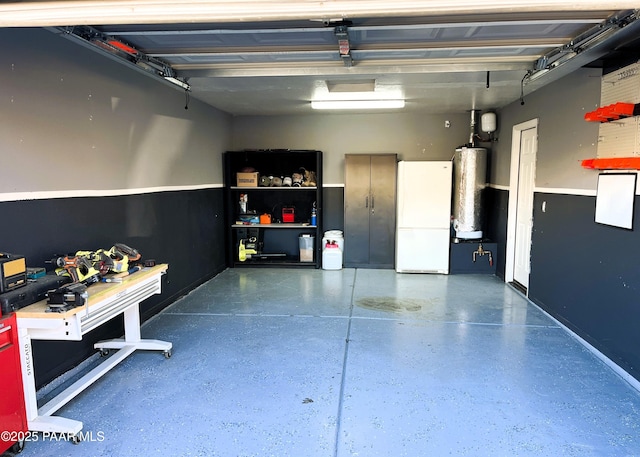 garage featuring white refrigerator and water heater