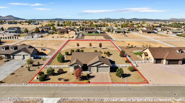 bird's eye view featuring a residential view and a mountain view