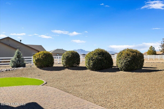 view of yard with a patio and fence
