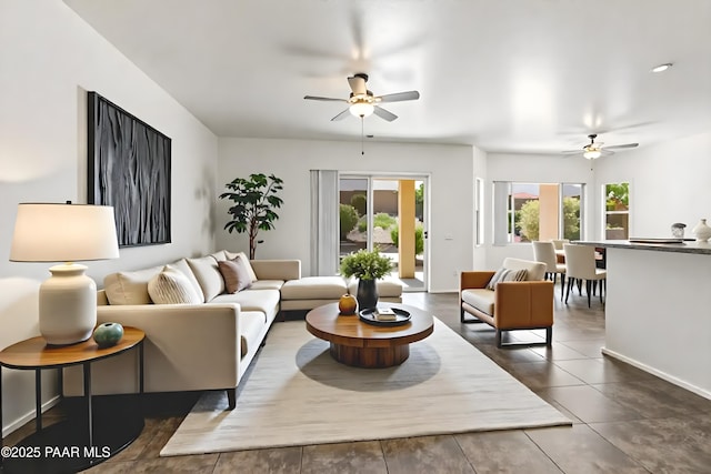 4276 N Pembroke St, Prescott Valley, AZ 86314 - living room featuring ceiling fan and dark tile patterned floors