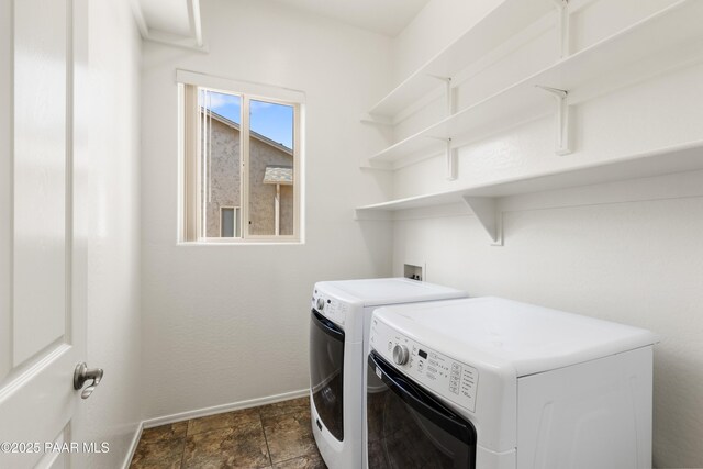 4276 N Pembroke St, Prescott Valley, AZ 86314 - laundry room with washer and clothes dryer and dark stone finish floors