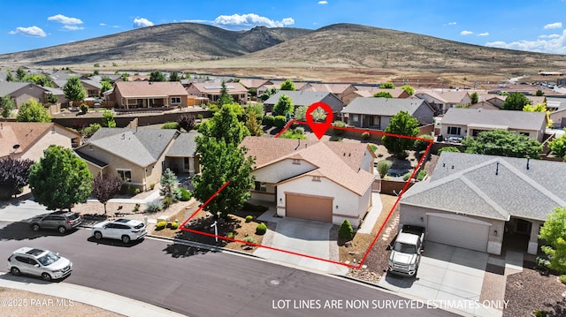 4276 N Pembroke St, Prescott Valley, AZ 86314 - aerial view of residential area featuring property boundaries highlighted and mountains