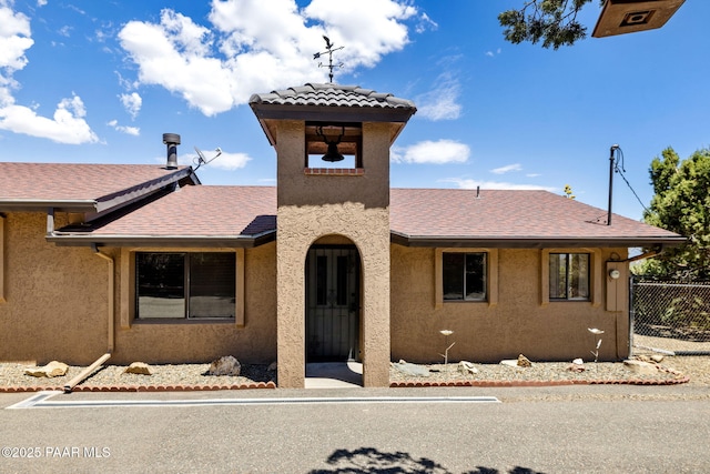 5712 W Sunrise Dr, Prescott, AZ 86305 - view of front facade with stucco siding and a shingled roof