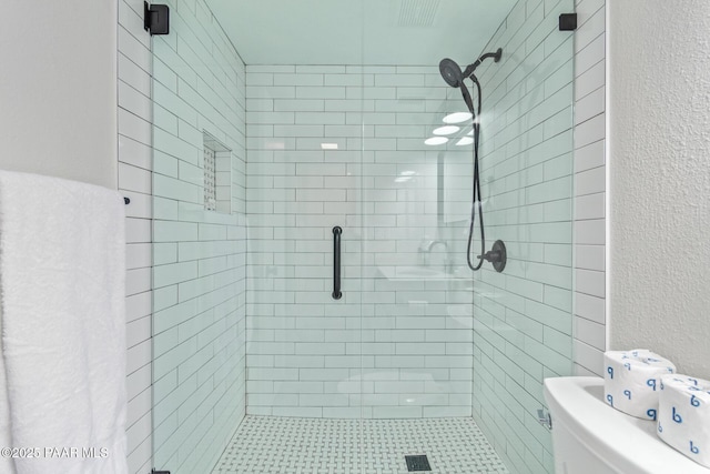 502 E Le Marche Ave, Phoenix, AZ 85022 - bathroom with a stall shower and a textured wall
