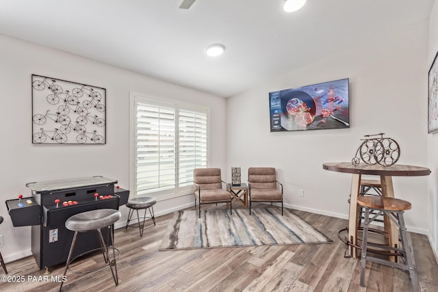 502 E Le Marche Ave, Phoenix, AZ 85022 - living area with baseboards and wood finished floors