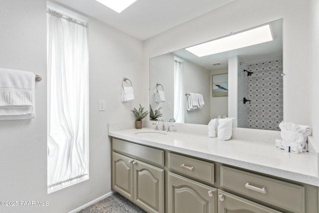 502 E Le Marche Ave, Phoenix, AZ 85022 - full bath featuring a tile shower, visible vents, and vanity