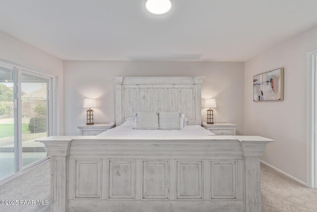 502 E Le Marche Ave, Phoenix, AZ 85022 - bedroom with access to outside, baseboards, and light carpet
