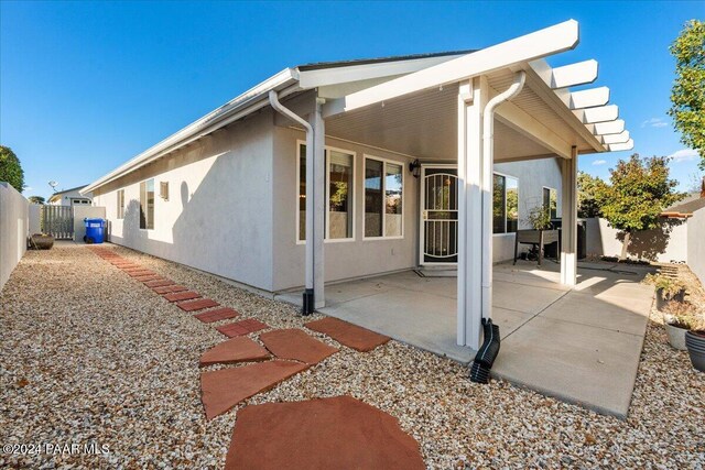 view of home's exterior with a patio area