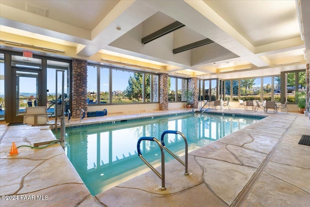 view of pool with french doors