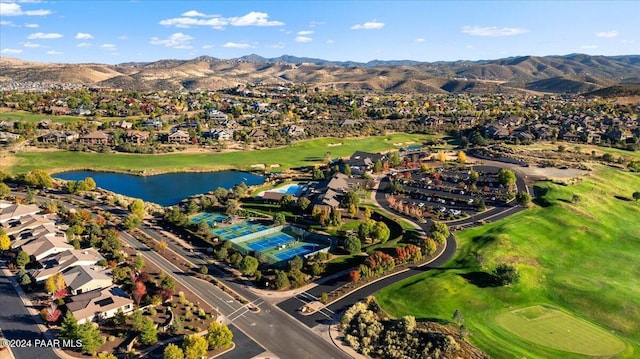 aerial view featuring a water and mountain view