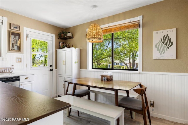 714 Mingus Ave, Prescott, AZ 86301 - dining space featuring a wainscoted wall and light wood-style floors