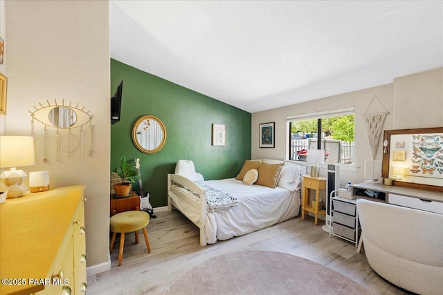 714 Mingus Ave, Prescott, AZ 86301 - bedroom featuring vaulted ceiling and light wood-type flooring